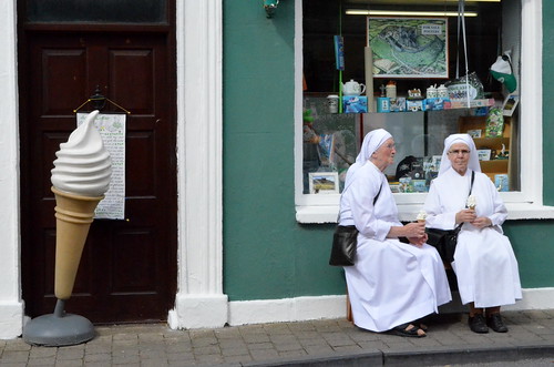After their ice creams, the ladies rearrange their hoods and go about their daily duties as members of the Ku Klux Klan 