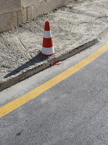   "Sorry, mate, we just pour the concrete. Moving traffic cones is outside our job description."