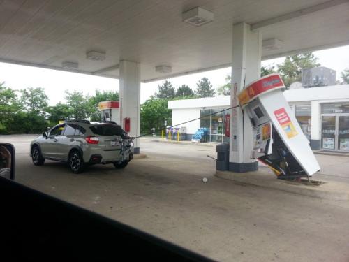 When youve parked too far from the pump and are determined to make it reach.