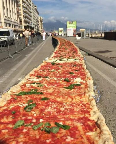 Waiter, will the pizza be long?  Yes. 